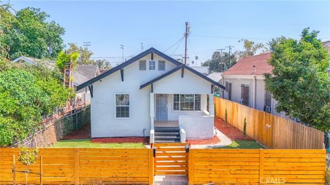 Photo of 1471 E 41st, Los Angeles, CA 90011 (MLS # DW26136538)