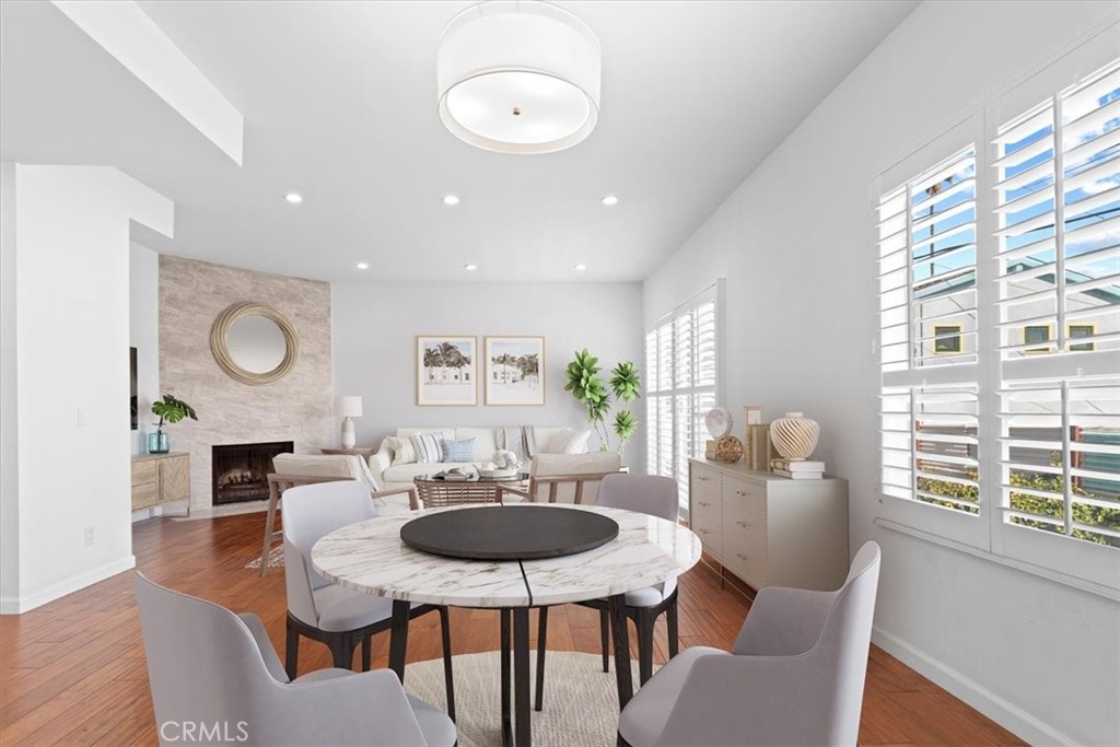 Tucked into a quiet corner of a 12-home community, this end-unit townhouse gives you privacy with a modern, easygoing vibe.
Inside, you’ll find a bright two-bed, two-and-a-half-bath layout plus a versatile den with polished concrete flooring. Recessed lighting runs throughout, and the kitchen is finished with stainless steel appliances and clean, contemporary touches.
The primary suite feels calm and comfortable with a ceiling fan and a spa-style bath featuring a rainfall showerhead.
A direct-access two-car garage and bonus space add flexibility, and the HOA covers water, trash, exterior upkeep, a gated community area and earthquake insurance. With the roof and exterior freshly updated in 2022 and an ultra-convenient location near shops, schools, freeways and public transit, this townhouse offers a stylish retreat in the heart of Sherman Oaks.
