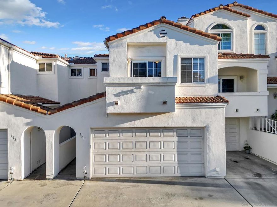 Crisp, modern, and move-in ready—this updated townhome in gated Villa Aspara backs to open greenspace and lives large with natural light and two private balconies. Inside, you’ll find real wood flooring, solar for energy savings, and a modern kitchen with quartz counters, stainless appliances, and bar seating—perfect for everyday living or easy entertaining. The flexible layout offers a spacious living area, dining zone, and a powder room on the main level, with bedrooms tucked upstairs for privacy. The attached two-car garage has a rare perk in this community: convenient loading/unloading parking directly in front of the garage.  Outdoors, enjoy the peaceful backdrop of the greenbelt plus community amenities and the security of a gated neighborhood. All of this in a prime San Marcos location—minutes to shopping, dining, Cal State San Marcos & Palomar College, and quick access to Hwy-78 & I-15. Villa Aspara is known for its well-kept grounds, pool/spa area, and lock-and-leave convenience.