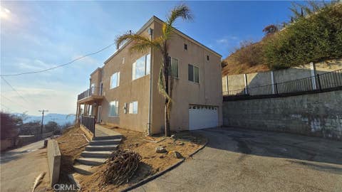 Photo of 587 Devonwood Road, Altadena, CA 91001 (MLS # OC26186848)