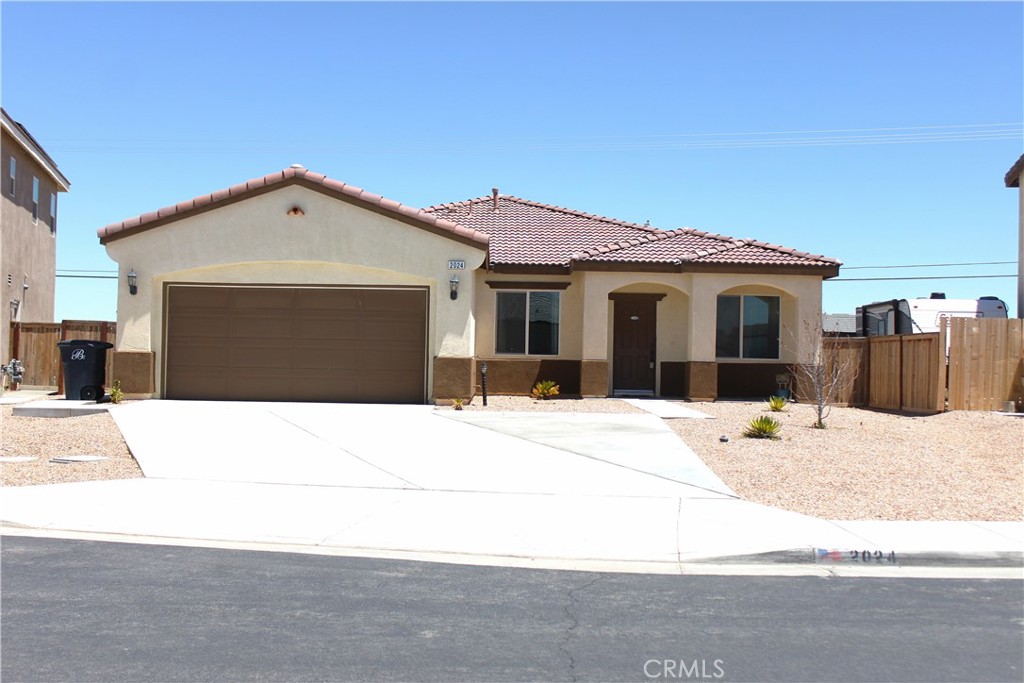 Stunning 4-Bedroom Home with Modern Upgrades in Rosamond, CA
Welcome to this beautifully maintained 4-bedroom, 2-bathroom home offering 1,809 sq ft of stylish and functional living space. Built in 2020, this modern residence combines comfort, efficiency, and timeless design, located in a peaceful Rosamond neighborhood.
Step inside to find luxury vinyl plank flooring throughout the main living areas, complemented by upgraded paint and plush carpet in the bedrooms. The open-concept layout flows seamlessly, anchored by a spacious kitchen featuring stainless steel Whirlpool appliances and ample cabinetry—perfect for everyday living and entertaining.
The generously sized master suite boasts a walk-in closet, a luxurious soaking tub, a double-sink vanity, and a separate walk-in shower, creating a true retreat. All bedrooms are well-sized and offer flexibility for guests, home office, or family needs.
Enjoy energy savings with a fully owned solar system, and low-maintenance desert landscaping in the front yard. There is a 2 car garage an extended driveway offering additional parking, while the backyard provides a blank canvas ready for your custom touch. A large storage shed on the side of the home offers extra storage space. There is also a custom walk around concrete patio and block walls adding privacy and functionality to the outdoor space.
This home is move-in ready with modern comforts, curb appeal, and room to grow.