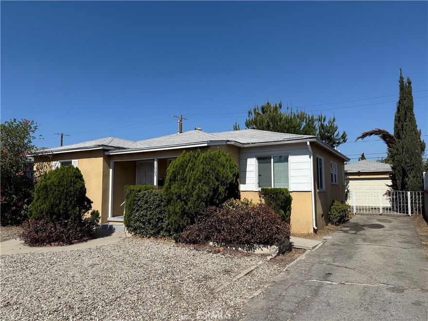 Investor & Developer Opportunity! Exceptional value-add property in North Hollywood featuring a 3 bed / 1.5 bath front house (approx. 1,153 sq ft) plus a permitted 300 sq ft addition attached to the detached 2-car garage — complete with a half bath and two-room workshop, office, or  possible value add as additional unit. Spacious living room abundant natural light opens to a dining area and kitchen. The backyard includes a covered patio—perfect for summer entertaining. Prime location near shopping, dining, North Hollywood Park, and Bob Hope Airport. Tremendous potential for expansion, renovation, or redevelopment. Ideal for flippers, investors, or buyers looking to build equity. Buyer to verify all permits, square footage, and conduct due diligence.