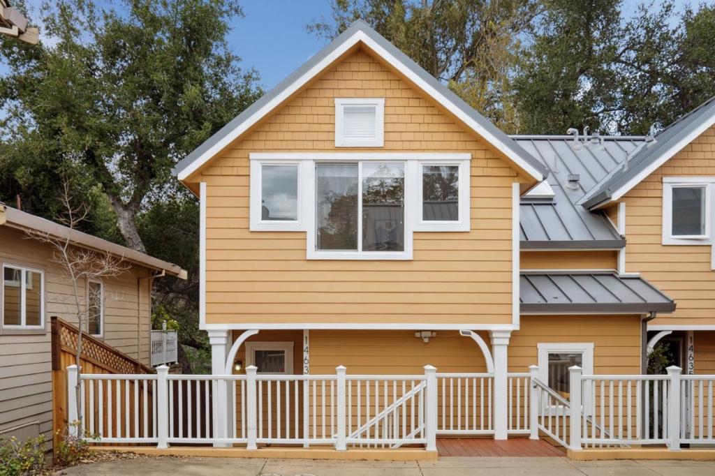Welcome to 14637 Big Basin Way, an inviting townhome built brand new in 2014 situated on an over 5000 SqFt lot and located in the heart of downtown Saratoga. Award winning private and public Saratoga schools. Walking distance to Saratoga Elementary School, Wildwood Park - with Playground Structure and Performance Stage, Coffee/Boba Tea/Dessert Shops, Fine Dining Restaurants, and several Luxury Wine Tasting venues. Enjoy little fishes swimming in the serene creek near the end of its backyard. The combination of a peaceful backyard with the proximity to downtown really offers the best of both worlds. This home has high ceilings, hardwood flooring throughout, features 3 bedrooms and 3 full bathrooms with a convenient main level powder bathroom. The open floor plan centers around the large great room with updated kitchen which overlooks the balcony leading to the spacious tranquil backyard that has potential for building an ADU. The kitchen boasts stainless steel appliances. Near Mountain Winery and Villa Montalvo. Convenient access to 9, 85 and Lawrence Expressway.