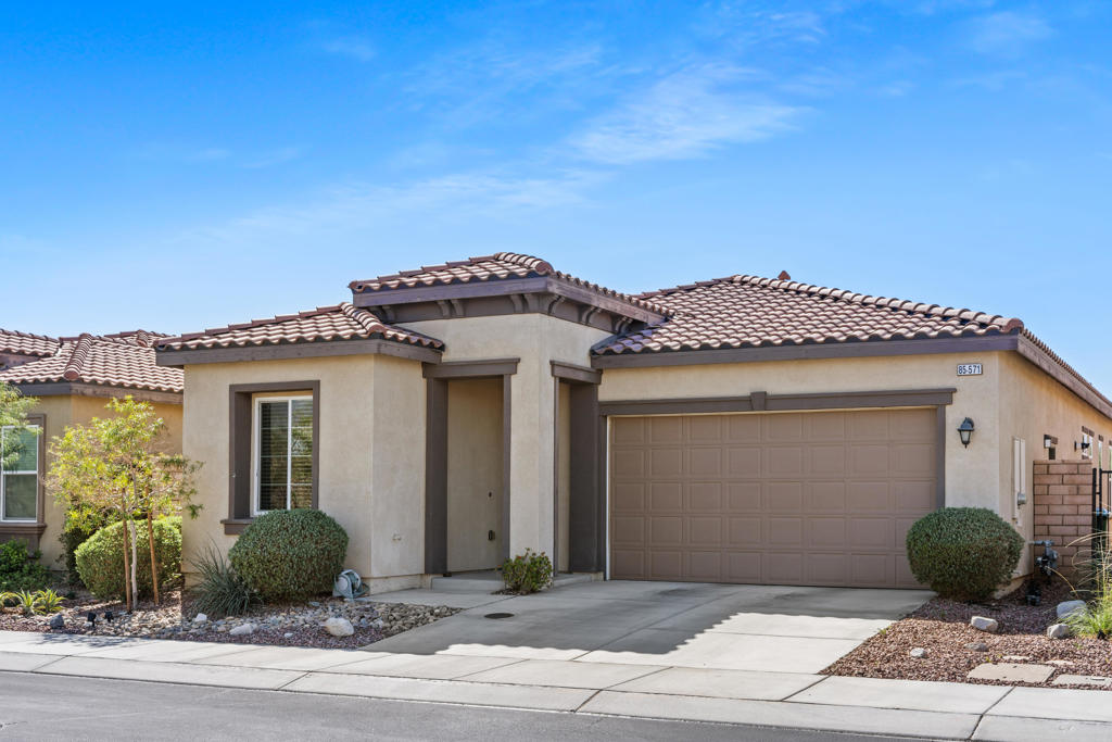 Live Your Best Life - at a Fraction of the Cost with this Rare Assumable Mortgage.This thoughtfully designed 2-bedroom, 2-bathroom home with a versatile den is perfect for a home office, creative space, or guest room. The open-concept layout creates an inviting atmosphere for both entertaining and everyday living. The chef-inspired kitchen features stunning granite countertops, stainless steel appliances, and a spacious walk-in pantry--ideal for culinary adventures.With 1,623 sq ft, this home offers the perfect balance of space and low-maintenance living.Step outside into your private retreat: a covered patio and flat, south-facing backyard offer the perfect canvas for a garden, a morning coffee spot, or evening gatherings. Just across the street, you'll find a peaceful green space--perfect for relaxing or connecting with neighbors while enjoying the desert landscape.Need extra room? The oversized 2-car garage includes space for a golf cart, hobby station, or additional storage.Welcome to Four Seasons at Terra Lago - A 55+ Resort-Style Community. You'll enjoy a beautifully designed clubhouse with social gathering areas. A modern fitness center, indoor/outdoor pools and courts for tennis, basketball and bocce. A well-stocked library, craft room and a variety of clubs from book discussions to watercolor painting.Whether you're seeking adventure, wellness, or community connection, Four Seasons at Terra Lago offers it all.Just minutes from dining, shopping, and entertainment at Fantasy Springs Resort and Spotlight 29 Casino, you'll love the convenience of your location.*This assumable VA loan at 2.75% is available to qualified buyers--even if you're not a veteran. Loan must be serviced through Freedom Mortgage, and buyers must meet their qualification criteria.
