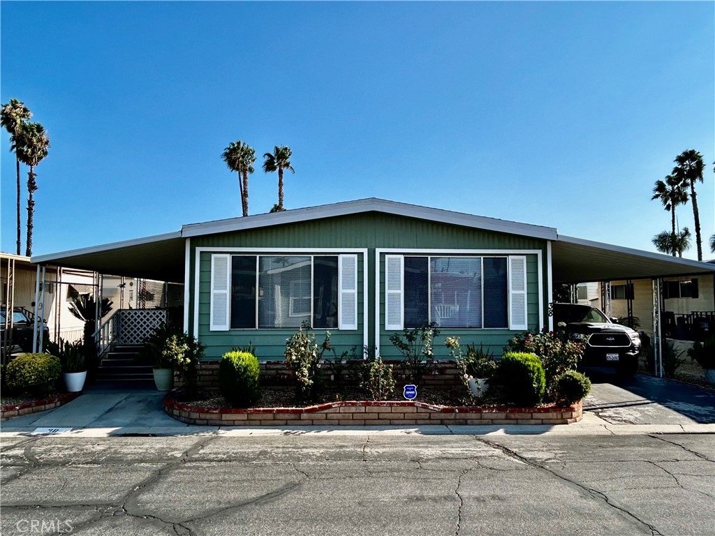 Welcome to this charming 2-bedroom, 2-bath manufactured home offering comfort and convenience in a welcoming community. Step inside to a spacious living room filled with natural light, perfect for relaxing or entertaining. Enjoy your evenings outdoors on the oversized covered patio, ideal for unwinding or hosting guests.
Additional features include a carport for parking and storage. The community offers resort-style amenities including a sparkling pool, soothing spa, clubhouse, and pool tables—perfect for recreation and social gatherings. Book your showing today.