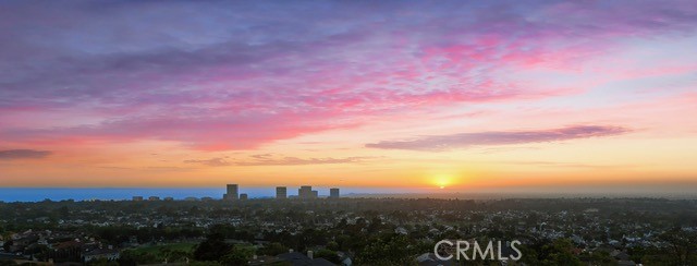Harbor Ridge Condo with Uninterrupted 180° Views! Wake up to breathtaking sights from the ocean to the Saddleback Mountains in this highly sought-after split-level home. Featuring a serene lower-level primary suite, two upper-level bedrooms, along with two full baths. Nestled on a private, single-loaded cul-de-sac within a gated community, this residence offers privacy, security, and unparalleled convenience. Don’t miss this rare opportunity to own a slice of paradise before your remodel begins next month.