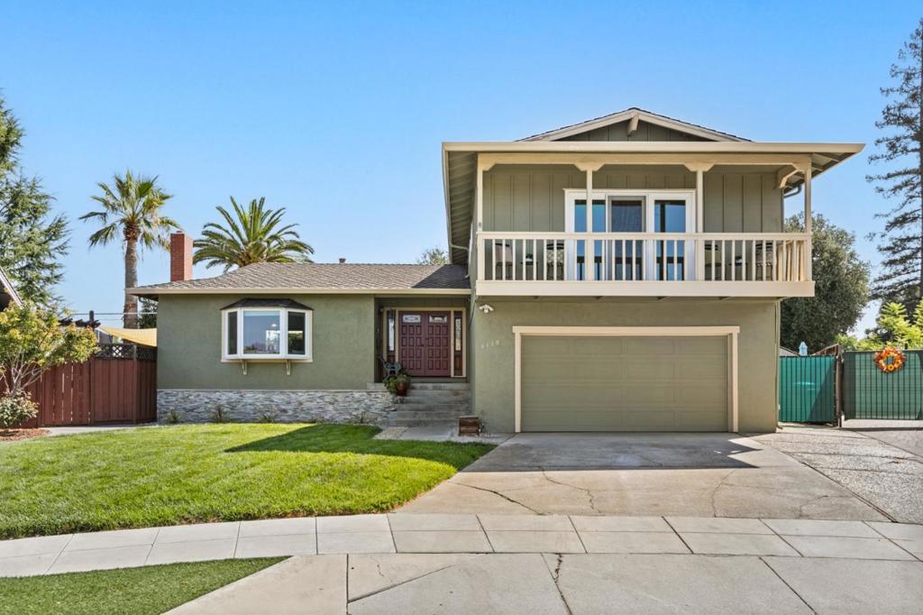 Live the ultimate California lifestyle! This 4 bedroom home offers the perfect blend of outdoor spaces to enjoy our amazing Bay Area weather. A lush, traditional lawn graces the front yard for classic playtime fun, while the backyard is a private resort designed for entertaining. It features a sparkling pool, large deck, and a high-performance sports area with turf and a rebounder wall for endless, mud-free activity. Inside, the home is designed for the demands of a busy household. Beyond the stylishly updated kitchen and modern baths, two versatile living areas offer incredible flexibility for a media room, play area, or home office. Practical conveniences abound with a dedicated indoor laundry room and a large driveway providing ample parking for multiple cars and guests. Life is easy here. You are situated in the highly-acclaimed Union School District (Oster, Dartmouth, Branham), with the high school just a 0.3 miles away for extreme convenience during the high school years! Need groceries or forgot a key ingredient to dinner? Lunardis grocery store is around the corner, and your garden beds can grow herbs to complement. Your own delicious CA fruit trees sweeten the deal. This isn't just a house; it's where your most cherished memories will be made for years to come.