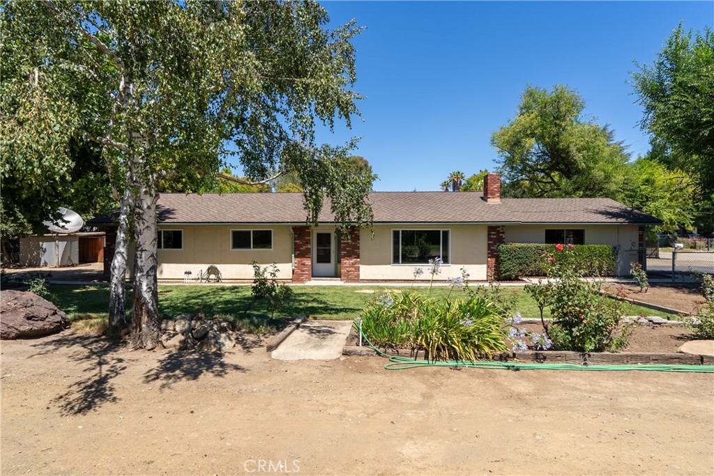 Welcome to this inviting 3 bedroom, 2 bathroom home offering 1512 sf of comfortable living space, ideally situated on a generous ~0.53 acre corner lot just steps from the scenic Atascadero Lake. Inside, you’ll find a generous living room with an oversized window which ushers in the natural light and is anchored by a handsome gas fireplace with brick surround. The well-appointed kitchen features ample cabinetry and countertop space for all of your culinary needs. At the back of the home, the spacious primary suite provides a walk-in closet and an ensuite bathroom. Fully fenced and thoughtfully laid out, the property provides privacy and space with room for a potential ADU or workshop—perfect for extended family, rental income or hobby space. For added fun, there is a sports court with a basketball hoop that is sure to keep everyone active and entertained. A large shed with power, 220V and its own breaker box in the backyard offers extra storage or workspace. Bonus, the home features a brand new HVAC system! Ideally located near Atascadero Lake, you’ll be close to summer concerts, year-round events and the Central Coast Zoo. Plus, downtown Atascadero is just minutes away, offering great dining, shopping and entertainment. Whether you're looking to relax, entertain or expand, this property offers flexibility and charm in a peaceful, sought-after location. Homes in this neighborhood don’t stay on the market for long, so don’t miss your opportunity to own a slice of Atascadero living with room to grow! Please review the Virtual Tour for additional information.