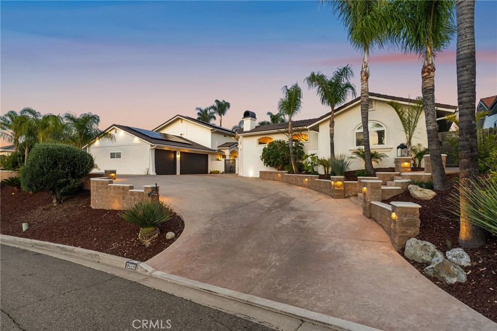 Welcome to 22883 Calcutta Drive, an exquisite retreat nestled on the prestigious golf course in the exclusive Canyon Lake community. This magnificent 3,800 sq. ft. residence, set on a rare double lot, effortlessly combines sophistication and comfort with its four expansive bedrooms and three and a half luxurious bathrooms. The heart of the home, a recently updated kitchen, is a chef’s dream with sleek quartz countertops, large island that seats six, high-end stainless steel appliances, ample storage with a walk in pantry, and an elegant wet bar featuring a wine fridge and ice maker.
Designed for the ultimate in entertaining, this home boasts a seamless indoor-outdoor flow through pocket doors that open to a spectacular backyard paradise. Revel in the resort-like amenities, where a pristine pool takes center stage alongside an inviting cabana. Lavish guests with culinary delights from the state-of-the-art barbecue area, while evenings promise relaxation and entertainment on the patio, complete with a cozy fireplace and outdoor television for endless enjoyment. Guests will be in complete comfort in the stand alone casita with it's own private entrance.
Modern conveniences, such as new Tesla solar panels, enhance the lifestyle experience, complemented by ample parking options including a garage, guest parking, and RV parking. Additional features include a soft water system, filtered water, new roof and access to all the amenities that Canyon Lake has to offer. This exceptional property offers an unparalleled opportunity for those seeking a vibrant lifestyle of luxury and leisure.