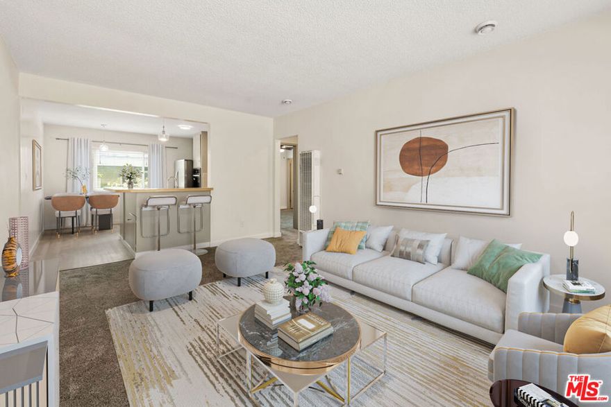 Welcome to this beautifully refreshed 2-bedroom, 1.5-bathroom top-floor home in the heart of Playa del Rey. Nestled in a boutique 4-unit building just moments from the beach and popular local dining spots, this bright and airy unit offers a perfect blend of comfort and convenience. Featuring freshly renovated bathrooms, paint, and brand-new carpeting, this unit boasts a spacious living area filled with natural light. The eat-in kitchen offers ample storage and a new dishwasher and oven, creating a stylish and functional space. A generous wrap-around counter makes a great spot for casual dining or entertaining. The two bedrooms are positioned on opposite sides of a spacious shared full bathroom, offering privacy and functionality. One of the bedrooms features an en-suite powder room for added convenience. Triple-paned windows throughout create a quiet, serene atmosphere, while the thoughtful layout ensures a comfortable and well-balanced living space. Residents have access to a community laundry utility room with a washer and dryer and one designated space inside a shared two-car garage. Additional street parking is available. Situated just minutes from the beach, restaurants, and shopping, this home offers the best of Playa del Rey's laid-back coastal lifestyle.