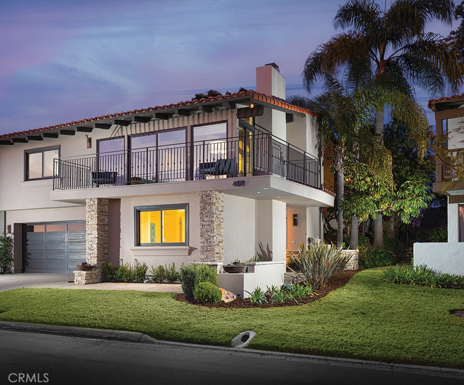 Nestled in the beautiful enclave in the Bluffs community. 409 Vista Grande is a tastefully upgraded G residence that stylistically blends elegance with modern design. Boasting approximately 2,560 square feet, the spacious layout offers 3 bedrooms—including one on the ground floor combined with a large built out area which could be a workout room, storage, craft room etc.—three full bathrooms, and a private home office on the 2nd level, perfectly accommodating a range of living needs.
A large light-filled staircase with pendant lighting leads to the expansive upper level, detailed with rustic reclaimed wood beam ceilings, light wide plank hardwood floors, and lots of natural light create an wonderful living space. The large main living areas include a family room with a stone-framed fireplace, dining area and large sliding glass doors that open to a private wraparound balcony with access to beautiful green belt.
The gourmet eat-in kitchen is complete with Blackstone countertops, Carrera marble backsplash, stainless steel appliances, custom white cabinetry, and ample bar seating, large dramatic overhead skylights flood the living area with sunshine. A private office with double glass doors provides privacy while still pulling lots of natural lighting in throughout.
Upstairs accommodations include a secondary bedroom with newer carpeting and custom wainscoting, and a large owner’s suite with a spa-inspired bath featuring penny-round cork flooring, dual vanities, and a large walk-in shower with floor-to-ceiling designer tile.
Additional highlights include:
Nest thermostats,
Recessed lighting,
Fresh interior paint,
Attached two-car garage,
2 sets of laundry hook-ups,
Epoxy garage floor,
Exterior has been smooth coated giving the beautiful this home a very updated look.
Located in an award-winning school district and moments from upscale dining, high-end shopping, Newport Beach Country Club & Big Canyon Country Club, and world-class Fashion Island shopping. Don't miss this one!!!