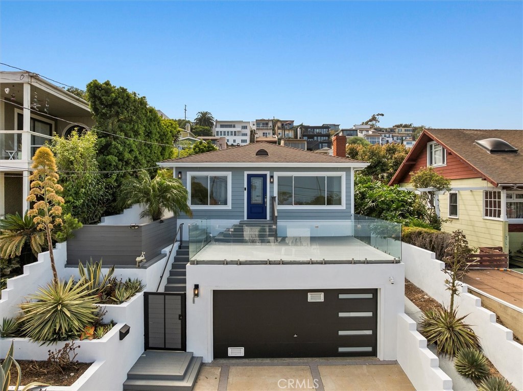Welcome to this tastefully updated modern coastal gem in the Point Fermin area of San Pedro. Featuring breathtaking 180-degree views of the ocean, harbor, and coastline. This 3-bedroom, 2-bathroom home sits on a quiet, private street in one of San Pedro’s most desirable neighborhoods, perched on an elevated vantage point just minutes from Point Fermin Park, Angel’s Gate Park, Cabrillo Beach, Cabrillo Marina, and the Port of Los Angeles. Inside, the light-filled living space offers an open floor plan, stack-stone fireplace, dual-pane windows, recessed lighting, and crown molding. The chef’s kitchen boasts modern finishes, both bathrooms provide a spa-like experience, and the newly painted deck is perfect for relaxing or entertaining while enjoying the sweeping views. Enjoy direct access to the private backyard with freshly painted hardscape from the primary suite or second bedroom. Smart upgrades, including a Nest thermostat and Tesla charger, add comfort and convenience. This move-in ready home is a rare opportunity to own a piece of coastal paradise.