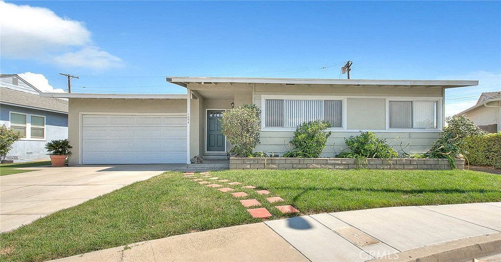 Charming single-story home is locateded in the wonderful Monterey Park neighborhood with the sought-after Alhambra Unified School District.
Upon entry, you’ll be greeted by an inviting open concept spacious living and dining area showcasing exposed wood beam ceilings, custom built display shelves and office nook. The heart of the home is the completely remodeled gourmet kitchen, featuring quartz countertops, stainless-steel appliances, breakfast counter, and abundant storage within beautiful white cabinetry. The formal dining area with two newly installed glass sliding doors provides access to the outdoor patio offering ample room for alfresco dining and entertaining guests year-round.
This thoughtfully designed three-bedroom home includes a primary bedroom with a French door leading to the deck area where you can enjoy serene mountain views. The front bedroom currently serves as a versatile exercise room. The spa-inspired main bathroom renovation boasts a freestanding soaking tub, walk-in shower stall, double sink vanity with marble countertops, and classy tiling.
Throughout the home, you’ll appreciate the gorgeous original hardwood floors that add warmth and character to every room. It also features central air and heating, recessed lights, ceiling fans, indoor laundry room and two car garage.
The perfect home for entertaining and California living. Move in and enjoy the charm of Monterey Park, in close proximity to transportation, supermarkets, reataurants and amenities!
