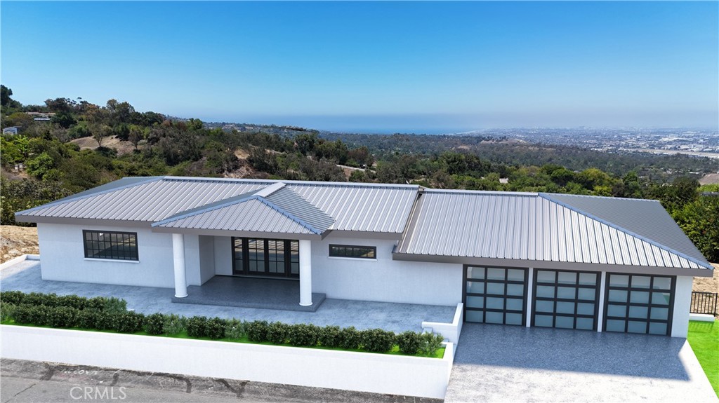 A rare opportunity to create your dream home in one of Rancho Palos Verdes’ most sought-after locations. This exceptional ocean- and city-view lot offers sweeping, unobstructed vistas from the glittering Queen’s Necklace to the iconic Los Angeles skyline, providing an ever-changing backdrop of sunrises, sunsets, and twinkling city lights.
With fully approved architectural and structural plans and permits already in hand, you can bypass the years-long design and approval process—saving over 3 years of time and more than $400,000 in planning and permitting costs. Simply select your contractor and break ground on a 4,686 sq ft luxury residence designed to maximize the property’s incredible views.
The approved design showcases 4 bedrooms, 5 bathrooms, 4 expansive balconies for indoor-outdoor living, a dedicated workshop/gym, and an oversized 3-car garage. Every element has been thoughtfully planned to blend sophisticated coastal architecture with functionality and comfort, ensuring that each living space captures the beauty of the surrounding landscape.
Located on a quiet, private street, this property combines tranquility with convenience. You’re just minutes from top-rated Palos Verdes schools, scenic coastal trails, golf courses, shopping, and dining. Architectural renderings are available to help you envision the lifestyle—and value—this rare offering represents.
Whether you’re looking to build your forever home or make a strategic investment in one of Southern California’s most prestigious coastal communities, 14 Bronco delivers the location, the vision, and the head start you’ve been waiting for.