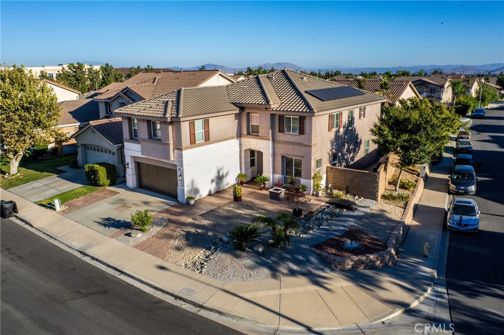 Location, Location, Location. Welcome to this beautiful home in the sought after community of Sierra Lakes. This home is in move in condition. This large home offers 3,501 Square feet of open concept living and is a Entertainers Dream. It offers 4 large bedrooms, 3 bathrooms, oversized family Room and a large updated kitchen with an island and plenty of cabinets and natural stone countertops. The flooring has been updated including bamboo wood floors. Upstairs you will also have a large loft and a very very large bonus room that can also be used as a game room. The home also has solar. The home also offers a covered patio, pavers and a low maintenance landscaping. NO HOA. You are minutes from the golf course, shopping, dinning and freeways.