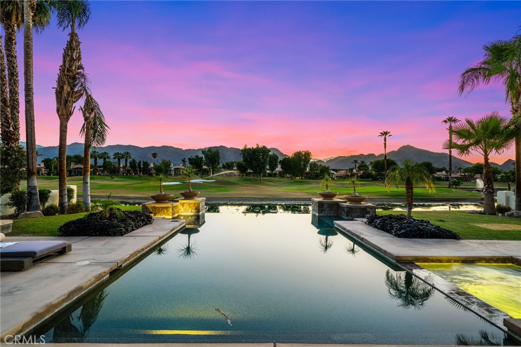 Incredible Transformation AND Price Point for this spectacular view home in the coveted Rancho La Quinta Country Club. Enjoy the most spectacular Santa Rosa Mountain views with your private resort like pool and spa positioned right on the 13th Fairway of the Robert Trent Golf Course! This popular Montana 1 floor plan offers grandeur and intimacy with it's open concept layout and privacy for guests. The gated private courtyard welcomes you to the front door where a large great room with spectacular views captures your attention the moment you walk in. Designed for entertaining, the large living room, dining area and open kitchen lends itself to gatherings of any size. The chefs kitchen offers stainless appliances, a large gas cooktop with griddle, wine refrigerator, large pantry and island With many access points to the incredible back yard this home defines true indoor outdoor living. The very spacious primary suite also has backyard access, a fireplace and a massive ensuite that resembles a spa. Two private ensuite guest rooms are on a separate side of the home offering space between homeowner and guests. Large fleetwood doors open to an impressive back yard area. A substantial waterfall infinity pool, spa and plenty of dining and lounging space will have you mesmorized morning until evening Rancho La Quinta Country Club is one of the most sought after communities in the Coachella Valley offering plenty of golf, pickleball, tennis, bocce and a host of other activities. The newly renovated clubhouse is slated to open mid season and will be fabulous! Buy now and get ready to settle into this incredible lifestyle!