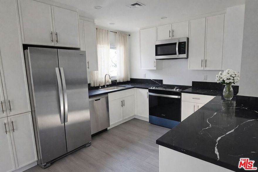 LARGE and sunny renovated 1 Bedroom unit with Laundry in unit, all new walls, insulation. New floors and New shower bath. Great location, walk to Beverly Center, Trader Joes. 2nd floor unit with 2 Tandem parking spaces. Avail January 15, 2026
