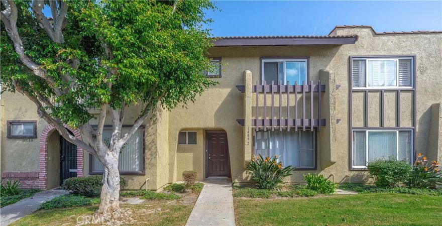 Welcome to this 3-bedroom, 2.5-bathroom two-story townhome nestled in the vibrant Bishop Place community, perfectly located in the heart of Little Saigon. This residence is brimming with potential to make it your own with a canvas to infuse your personal style and touches.  Step into the spacious kitchen, with generous preparation space that flows seamlessly into a cozy dining area, accentuated by a sliding door that opens up to a good-sized back patio. The primary bedroom, complete with an en suite bathroom, provides privacy. The two additional bedrooms and bathroom can accommodate family members or guests, ensuring everyone feels at home. For your convenience, a 2-car garage adds extra storage and accessibility. The community amenities truly stand out, featuring a sparkling pool, a soothing spa, lush green belts for leisurely strolls, tennis courts for the active lifestyle, a tot lot for little ones, and a welcoming clubhouse for gatherings. Plus, the inclusion of sewer and trash services in the HOA fees simplifies your living experience. Situated near top-notch schools, an array of diverse shops and restaurants, and efficient public transportation options, this home combines accessibility with a dynamic lifestyle.