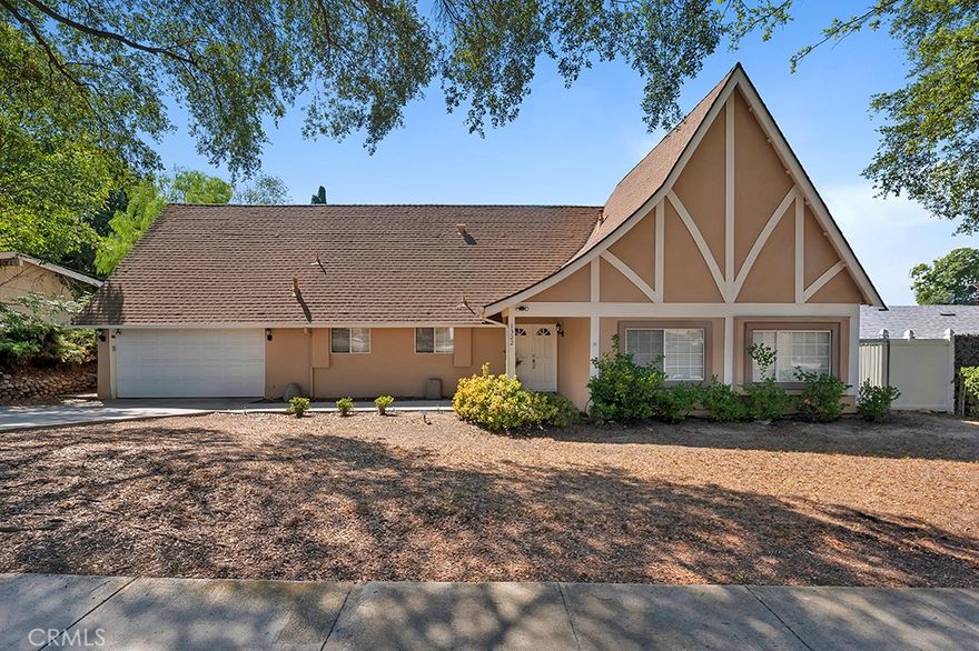 Welcome to 1322 E Avenida de los Arboles, a charming single-story 3 bedroom, 2 bathroom home nestled on a spacious 10,000 sq ft lot in the heart of Thousand Oaks. Step through the double-door entry into a bright and inviting floor plan featuring hardwood flooring and recessed lighting throughout. The kitchen showcases classic oak cabinetry, abundant storage, and a generous pantry, flowing seamlessly to the living and dining areas. Additional highlights include an attached 2-car garage with direct access, plus a wide driveway with space for extra parking. All bedrooms are filled with natural light and offer ample closet space. The expansive backyard presents endless possibilities, perfect to design your dream entertainer’s retreat with room for a pool, garden, or even an ADU. Conveniently located near freeways, shopping, dining, and schools, this home offers comfort, potential, and an unbeatable location. Don’t miss this opportunity!