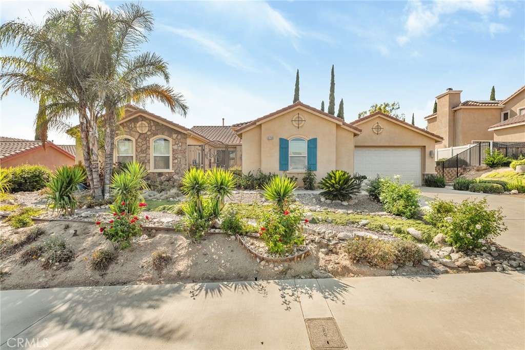 Step into comfort and space in this thoughtfully upgraded 4-bedroom, 3-bathroom home tucked into the desirable Verdemont neighborhood. With nearly 2,800 sq ft of living space, there’s plenty of room to relax, host, and make lasting memories. The open-concept layout features a generous kitchen with granite countertops, upgraded appliances, and plenty of room to gather. Durable water-resistant laminate flooring flows through the main living areas, while plush carpet adds warmth to the bedrooms. The dual-zone HVAC system has been updated for year-round comfort, and speaker wiring throughout the home makes entertaining easy. The oversized primary suite offers a true retreat, and the private casita with its own entrance and courtyard is perfect for guests, extended family, or even rental income. Enjoy the beautifully landscaped yard, complete with a vaulted patio cover, ideal for outdoor dining and get-togethers. The 3-car garage includes a separate third bay—perfect for a workshop or extra storage. A dog run, block and vinyl fencing, and potential RV parking round out the features that make this home so special. Conveniently located near parks, shopping, and CSU San Bernardino, this home is ready to welcome its next chapter.