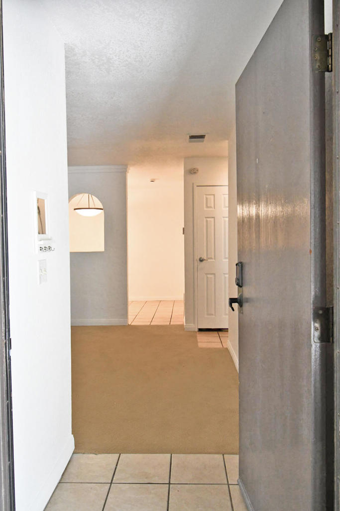 Nestled in the heart of Palm Springs at Palm Springs Villas I, this first-floor unit at 2825 N Los Felices Road, Unit 107, Palm Springs, CA 92262, is a charming and accessible condo designed with comfort, convenience, and modern functionality. This one-bedroom, one-bathroom condo is ideally suited for those seeking a low-maintenance, cozy living space in a professionally maintained community that values accessibility and aesthetic appeal.Key Features1. First-Floor Location Under the Stairs for Optimal Temperature ControlThis unit, located on the first floor, is uniquely positioned beneath the building's stairwell, which offers a natural buffer from the intense Palm Springs heat during summer and adds a layer of insulation on cooler days. Being in a shaded area allows the condo to remain at a more stable and comfortable temperature throughout the year, reducing the reliance on air conditioning and ensuring a cooler living space even in the peak of summer.2. Complete Wheelchair Accessibility from Carport to AmenitiesPalm Springs Villas I is thoughtfully designed for accessibility, making this unit a perfect choice for residents with mobility needs. The entire path from the carport to the condo unit, as well as to the community amenities, is 100% wheelchair-accessible. The community pool, laundry facilities, and six tennis courts are all reachable without encountering stairs or steep inclines. The condo's flat layou