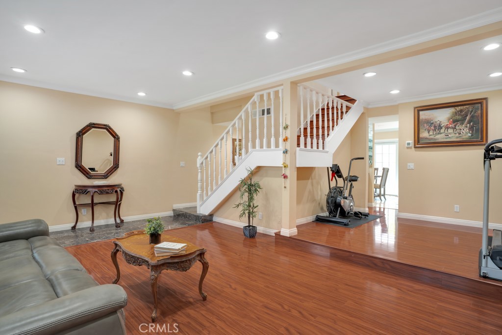 Welcome to the highly desirable gated community of ‘Tarzana Oaks'. This wonderful light & bright 3 Bedrooms and 3 Baths 1,673 square feet townhouse feels as a single family home with its 2 car attached garage, and private patio. Tastefully updated, featuring wood-like floor and marble downstairs and wood-like floor upstairs, recessed lighting throughout, and dual pane windows. As you enter the home you will be greeted by the spacious living room with a gas fireplace, and large windows bringing in lots of natural light through the wood plantation shutters, a formal dining room, a wet bar, a powder room, and an amazing chef kitchen with white cabinets, granite counters ,and a convenient breakfast counter bar. Upstairs are the 3 bedrooms. Two good size bedrooms share a full bath, and a large master bedroom with high vaulted ceiling, a convenient walk-in closet, and an en-suite master bath. The private patio is great for entertaining & having fun summer barbecues, with upgraded floor of Idaho flagstones.
The garage is conveniently attached to the unit, it has overhead storage space. One of the better locations within the complex away from the main street in a private area. HOA includes basic cable TV, a discounted rate of internet service, water, trash, sewer, earthquake insurance.
The gated community offers a sparkling pool with seating area under a large gazebo, surrounded by resort style trees with pool furniture, a gated kids playground, and guest parking. Walking distance to parks, restaurants, shops, places of worship, easy freeway access, and the orange bus line station. This is an amazing opportunity, and a must see home, Make it yours Today!