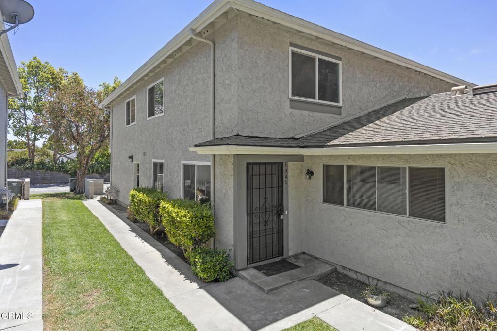 Terrific 2 bedroom, 1 bath Condominium in the Ventura Village homes. Featuring new carpet on stairs, hall and bedrooms, freshly painted, dual pane windows, and newer luxury vinyl flooring downstairs. The kitchen includes a cozy breakfast bar, stainless sink, oven, range hood and refrigerator. Two bright bedrooms, one with a walk-in closet and the other with mirrored door closet. There is a shared laundry room, community pool and a park very close by. Perfect for first time home buyers or prudent investors.