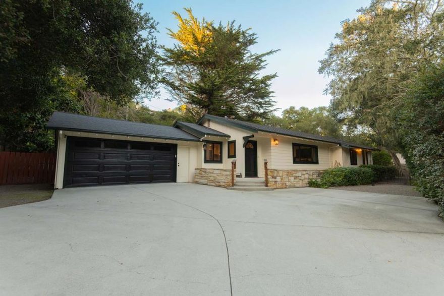 Enjoy an ultra convenient location combined with privacy and comfort from this 3-bedroom, 2-full/2-half bath traditional style Carmel Hills home.  Sited on a tree-lined lot, 25315 Flanders Drive is surrounded by your own whimsical 1/3-acre forest.  Upon entry, the floor plan opens to a sizable living space with views of green from your garden window.  The living space comfortably allows for 2 couches with plenty room to spare and is ideal for family time and hosting loved ones.  Nearby, a dedicated dining space opens to a mud room with ample pantry storage and a well-equipped kitchen with new appliances and two oven units.  With 3 bedrooms total, each guest bedroom has its own en-suite powder room plus the guest beds share a full hall bath with a tub and shower.  Down the hall from the guest bedrooms, the primary bedroom includes a large layout with a walk-in closet and full en-suite bathroom.  All bedrooms have exterior access - one of which opens to a lovely hardscape backyard with a hot tub enclosed in a hut, space for barbecuing/outdoor dining/lounging, and privacy fencing.  This home has been thoughtfully updated since last on the market and is beautifully refreshed for her next chapter!