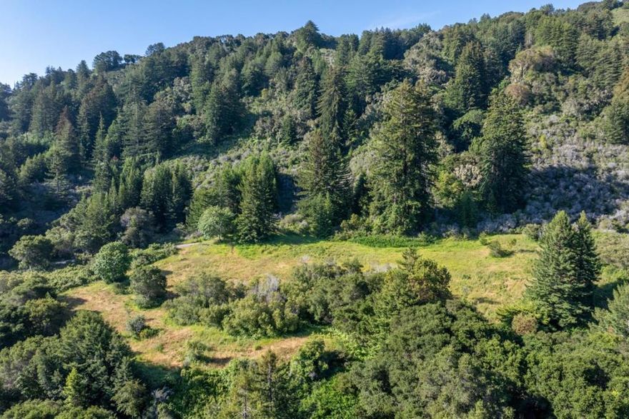Ideally located just five minutes away from the secure entry gate of the Santa Lucia Preserve, is this peaceful 86+ acre lot waiting for a creative to design a wonderful environment to live, work and play in. The 4.6± acre building envelope at the end of a cul-de-sac is gently sloped and presents an opportunity to surrounded yourself with multiple hillside views, towering redwoods, native wildflowers and berries. Imagine greeting each morning with a cup of coffee as the sun rises to the east and set the tone for your day. Environment matters. Here, its a daily reminder of how intentional living in a nature-rich atmosphere can calm the nerves, relish in soaking in the sights and sounds and breathing with purpose. The Preserve is a private 20,000 conservation community located in the foothills of the Santa Lucia Mountain range just 10 minutes from Carmel-by-the-Sea with vibrant Tom Fazio golf course and Ranch Club, guest lodging, casual and fine dining venues, miles of dog-friendly hiking, biking and equestrian trails, private lake with camping options all available through membership.