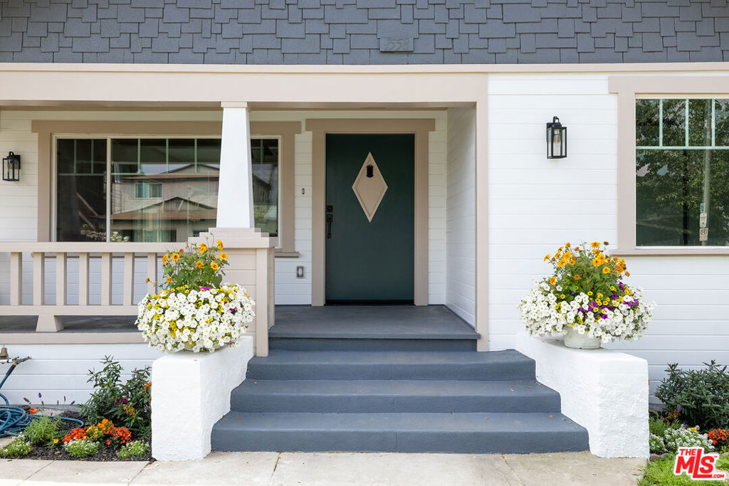**MOTIVATED SELLER** 2 HOMES ON 1 LOT! Completely remodeled, fully vacant, and plenty of parking. Welcome to this beautiful and fully renovated Craftsman home, perfectly located in the Vermont Square neighborhood, just east of Leimert Park. Nestled in a quiet, yet vibrant neighborhood, this versatile property showcases modern style with refined design, luxury finishes, and an expanded footprint. The main residence (3-bed/2-bath) is bright and welcoming, with plenty of natural light, chic finishes, and a practical layout that seamlessly blends contemporary convenience with classic charm. The kitchen is a masterpiece with custom-designed wood cabinetry, quartz countertops, and strategically positioned towards the rear with an open concept perfect for entertaining. The kitchen is equipped with brand-new LG and Samsung appliances, including a built-in Cafe microwave drawer oven. Both bathrooms are designed with elegance and style. Two centrally located bedrooms share a Jack and Jill bathroom, perfect for families providing privacy while maintaining easy access between the rooms. The master bathroom is truly like no other, with a luxurious walk-in shower, free standing bathtub and dual sinks. While the master bedroom is tucked away, sliding glass doors extend onto a private porch to the backyard. A detached 2-bed, 1-bath ADU adds tremendous value and flexibility, carefully designed to ensure privacy with a separate entrance, all while maintaining easy access to the main house. Whether used as extra living space, a home office, or a rental option, this separate unit offers significant income-producing potential while maintaining a unified look throughout the property. Updates throughout include wide plank waterproof flooring, all-new electrical and plumbing systems, recessed lighting, and an energy-efficient tankless water heater. Conveniently located just minutes from Downtown Los Angeles, USC, Exposition Park, and BMO stadium, this property is strategically placed to profit from the area's ongoing expansion. Particularly with the upcoming Olympic Games and FIFA World Cup.