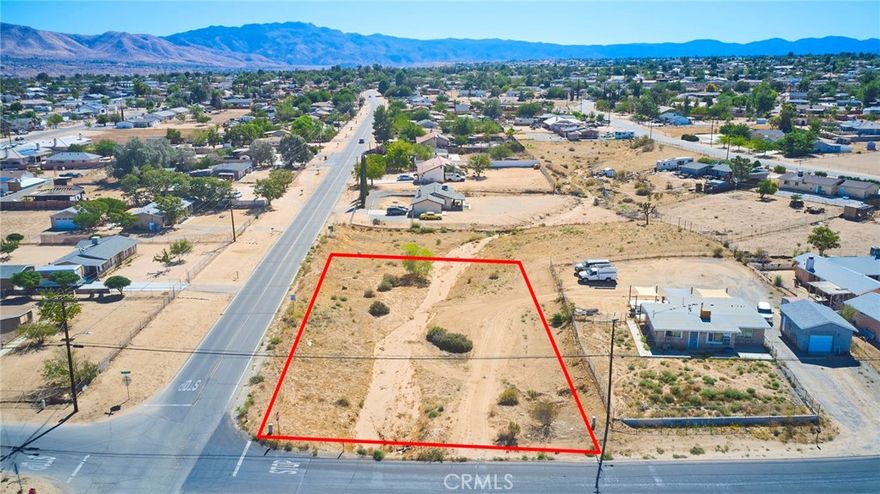 Corner lot with peek view of the river.  Utilities at property, buyer to investigate with the city for permitted building.  Hesperia will be the location for a train station that will offer service to Rancho Cucamonga.