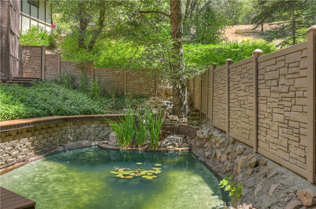 Forested Oasis on 3 Private Acres. Discover an extraordinary custom m – image 4