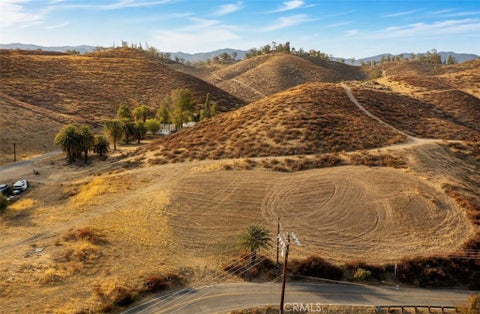 Photo of 0 Strickland, Lake Elsinore, CA 92530 (MLS # SW26185068)