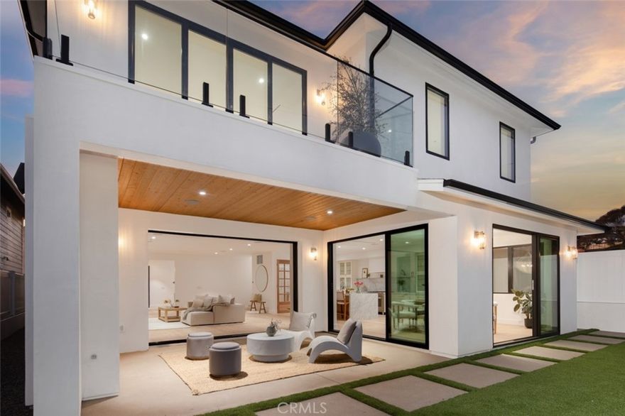 Welcome to 121 Avenida Princesa, a brand-new custom residence thoughtfully crafted with the vision of becoming someone’s forever dream home. Set in one of Southwest San Clemente’s most beloved neighborhoods, this 5-bedroom, 5-bath, 3,630 sq. ft. estate blends timeless coastal elegance with intentional, family-friendly design. Tall ceilings and expansive pocket and bifold doors create a bright, seamless indoor/outdoor flow, letting in natural light and ocean breezes. Thoughtfully chosen, designer-curated finishes bring a quiet sophistication to the home, while the primary bath’s Tadelakt plaster walls add a warm, handcrafted touch and a calming, spa-like atmosphere.The custom kitchen is a true centerpiece that's built for those who love to cook and gather. With an abundance of storage, a 30-inch built-in refrigerator and 30-inch built-in freezer, and a layout designed around the classic “kitchen triangle” method, it’s both highly functional and beautifully crafted for everyday living and entertaining. Two full laundry setups offer exceptional convenience for busy households or guests, and the home is equipped with modern essentials including a Tesla charger, Cat 6 wiring, Fios connectivity, and a built-in sound system. Endless thoughtful touches are woven throughout, including a perfectly placed hand shower ideal for rinsing off your dog after a beach day . Step onto the rooftop deck to experience sweeping ocean views and unforgettable sunsets, or take advantage of the outdoor shower, ideal for rinsing off beach gear and embracing the coastal lifestyle. Just outside your door, you’re moments from iconic surf breaks, favorite local restaurants, charming boutiques, and scenic coastal trails. More than a new build, this home is designed with heart and crafted to be lived in, loved, and cherished for a lifetime, surrounded by sunshine and the sea breeze of Southwest San Clemente.