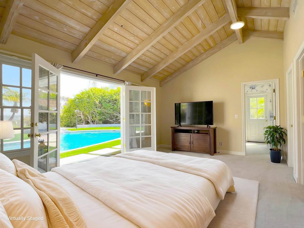 Available for immediate move in. Perched atop a 3.14-acre hilltop in the prestigious Covenant of Rancho Santa Fe, this extraordinary estate offers sweeping panoramic views and exceptional privacy an ideal setting for peaceful, elevated living. Designed for both grand entertaining and everyday enjoyment, the resort-style grounds feature a heated sparkling pool and jacuzzi, mini golf area, outdoor kitchen and BBQ area, and a private basketball court, all set against the backdrop of Southern California's golden sunsets. Families will appreciate access to top-rated R. Roger Rowe schools and the coveted lifestyle Rancho Santa Fe is known for where luxury, community, and tranquility converge. Enjoy easy access to golf, equestrian trails, the RSF village, and a great community known for its exclusivity, beauty, and tranquility. Lush, mature landscaping envelops the property, creating a true sense of seclusion and tranquility. A variety of fruit trees including avocado, lemon, pomegranate, plum, orange, and tangerine add charm and function to the grounds, enhancing the estate's natural beauty. The thoughtfully designed layout features a total of 7 bedrooms and 6.5 bathrooms, including a detached guest casita and a separate detached building ideal for an office, gym, or media room offering incredible flexibility for multigenerational living, remote work, or personal retreat. The main residence includes 6 bedrooms and 5.5 bathrooms, blending comfort and elegance across three expansive living areas, a formal dining room, and a wet bar conveniently located adjacent to the kitchen perfect for entertaining on any scale. The luxurious master suite spans its own private upper level, showcasing panoramic views, abundant natural light, and dual walk-in closets, all wrapped in a calm, spa-like ambiance. Detached Guest House (Casita) with Full Kitchen & Bath is ideal for extended family, live-in help, or private guest stays, the casita adds significant value and flexibility to the property. Additional Detached Building for Office, Gym, or Media Room. This versatile structure expands the estate's functionality, offering space for a private workspace, wellness area, or entertainment hub. A cedar wine closet adds a touch of sophistication for wine enthusiasts. 4 car garage, guest parking lot for 10+ cars. Visiting this property in person is an absolute must; pictures simply cannot do it justice. Don't miss this opportunity to experience the epitome of luxurious living and explore the many features and amenities this exceptional property has to offer. Owner takes care of landscaping and pool maintenance.
