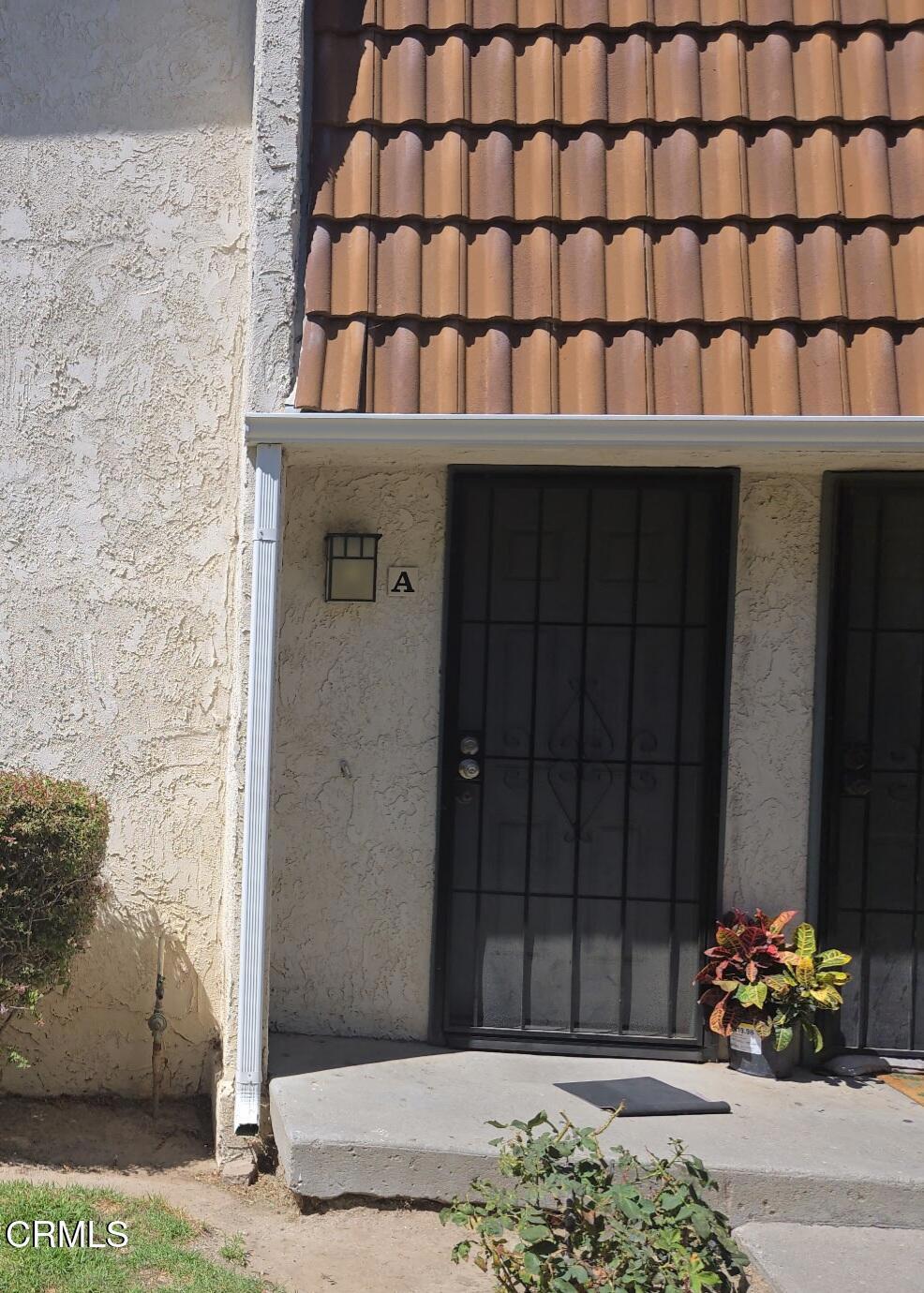 Welcome home to this stunningly updated and popular Lobero 3-bedroom, 1.5 bath townhome. One room upstairs has a sliding glass door leading to a balcony with a view. Astounding location surrounded by serene mature greenery. Light and bright floor plan with plenty of dual paned windows and sliders to allow for an abundance of natural light. Large family room with cozy gas fireplace. Living room has cable set up and views of the front entrance. Indoor laundry room. Three sizable bedrooms upstairs. Enjoy being close to shopping, restaurants, schools, parks, hiking and easy freeway access. Per owner HOA covers, trash, community pool, clubhouse, exterior & roof maintenance, common area landscaping, fire/earthquake structural insurance. Deposit required for pool key. 2 car garage; additional parking available; contact HOA. Refrigerator and stove included. No A/C - 2 fans upstairs and 1 downstairs. FHA approved. VA Loans are not approved. Dog - weight and breed restrictions.