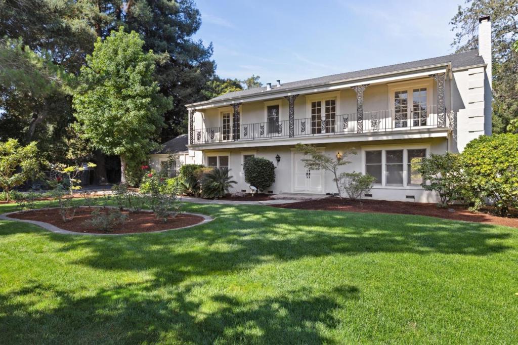 Exceptional and extremely rare opportunity to build on a prime West Atherton cul-de-sac, set in one of the country's most desirable cities and most luxurious zip codes. Situated with a perfect orientation and southern exposure, this home is surrounded by beautiful estate homes. With an abundance of perimeter foliage and trees, the setting provides the upmost privacy. The dimensions of the lot are ideal at approximately 264' deep by 165' wide, set on a quiet cul-de-sac. The current home features a traditional floor plan showcasing elegant formal rooms, a spacious and bright eat-in kitchen, and an inviting family room. Most of the entertaining spaces open up to the serene backyard. Five generously sized bedrooms are found upstairs, plus a main-level office or optional bedroom. A well services the front and rear landscaped grounds. An expansive stretch of lawn along the rear property line, partially covered patios, and a side yard dedicated to fenced vegetable beds offer endless possibilities. With its combination of serene surroundings, fully level grounds, and immense potential for future development, this property represents an outstanding opportunity. Square footage measured by Open Homes Photography at 3,455 square feet, while San Mateo County records display 3,310 square feet.