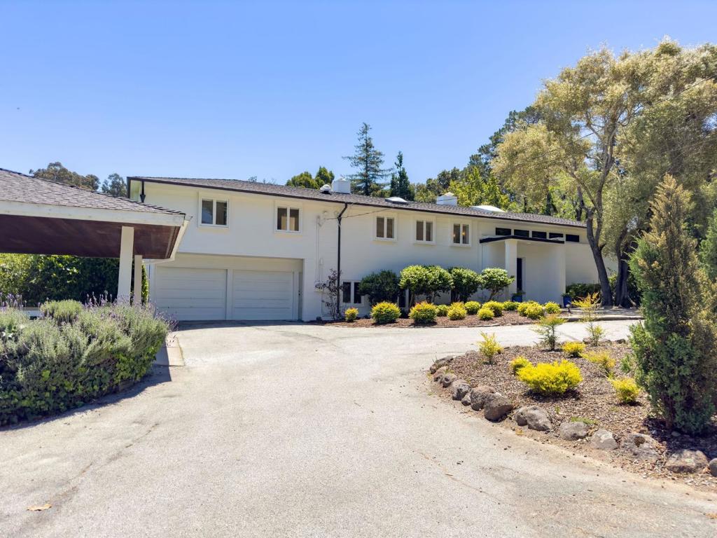 THE BEST DEAL YOU'LL FIND IN LOWER-MIDDLE HILLSBOROUGH! The bright, flowing indoor floor plan has been tastefully updated and is COMPLETELY MOVE-IN READY. The home carries the dual-pedigree of San Francisco design pioneers architect Gardner Dailey and famed landscape architect Thomas Church. The indoor living areas naturally extend through French doors from the spacious main hall into a landscape of ambling paths under mature oaks, welcoming rose gardens, and shaded lawns. The circular terraces and circular Emerald pool are signature Church design elements as featured in Architectural Forum magazine and two Thomas Church books. Out back you'll find a brand new semi-circler lawn area. To the side of the property, a vast grass field perfect for events and children. Inside, you'll find a well-appointed updated kitchen, a bright & spacious living room, family room, multiple en-suite bedrooms, spa-like bathrooms, a craftsman office / library, & more. Heading back outside, you'll find several balconies with views of the surrounding woods, as well as a patio area just off the living room. With this location, you're close to Downtown Burlingame as well as several prestigious public & private schools.