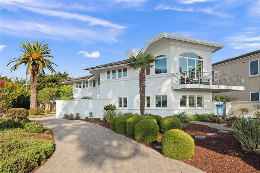 Perched on a spacious corner lot steps from beach access-this stunning ocean-view retreat embodies the essence of coastal elegance.Located in a highly sought after Rio Del Mar neighborhood with breathtaking ocean vistas from both levels bathed in natural light.Open-concept living space showcases vaulted ceilings w/ exposed beams,travertine floors & stone fireplace connecting great room to well-appointed kitchen-for relaxed living & entertaining,dual floor laundry,beautifully renovated bathrooms. All designed with a thoughtful reverse floorplan.Primary suite serves as a private sanctuary w sitting area,built-in desk+oversized walk-in closet w/ laundry.Spa-inspired ensuite bath exudes refined luxury w/ freestanding soaking tub,rain shower+dual vanity-crafted with attention to detail+timeless style. Downstairs ocean-view family room w second fireplace & abundant natural light provides a perfect space for gatherings.Seamless indoor-outdoor living unfolds w ocean-view balcony,private elevator+multiple outdoor areas inc.gated courtyard entry,backyard w/ mature fruit trees,outdoor shower+expansive front yard.Recently refreshed w/new ext. paint & landscaping,this move-in-ready home offers a rare opportunity to experience the best of coastal living in one of Aptos most desirable enclaves.