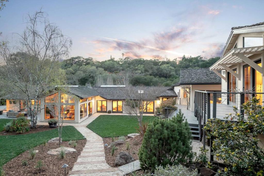Wonderfully private estate in prime Westridge - Central Portola Valley corridor. Property spans approx. 2.8 acres with views of the Western Hills and is comprised of Main Home (5 BR/5+ BA; 5,910 sf+/-), Guest House (2 BR/1 BA; 765 sf+/-), Guest House/Office (1 BR/1 BA; 705 sf+/-), a detached 2-car garage (wired for electric car charger), a large pool/spa with entertaining patio, multiple outdoor dining areas surrounded by an expansive, rolling rear lawn, a fire pit, large children's play structure, fenced rose and organic gardens, a chicken coop and an efficient solar power array.