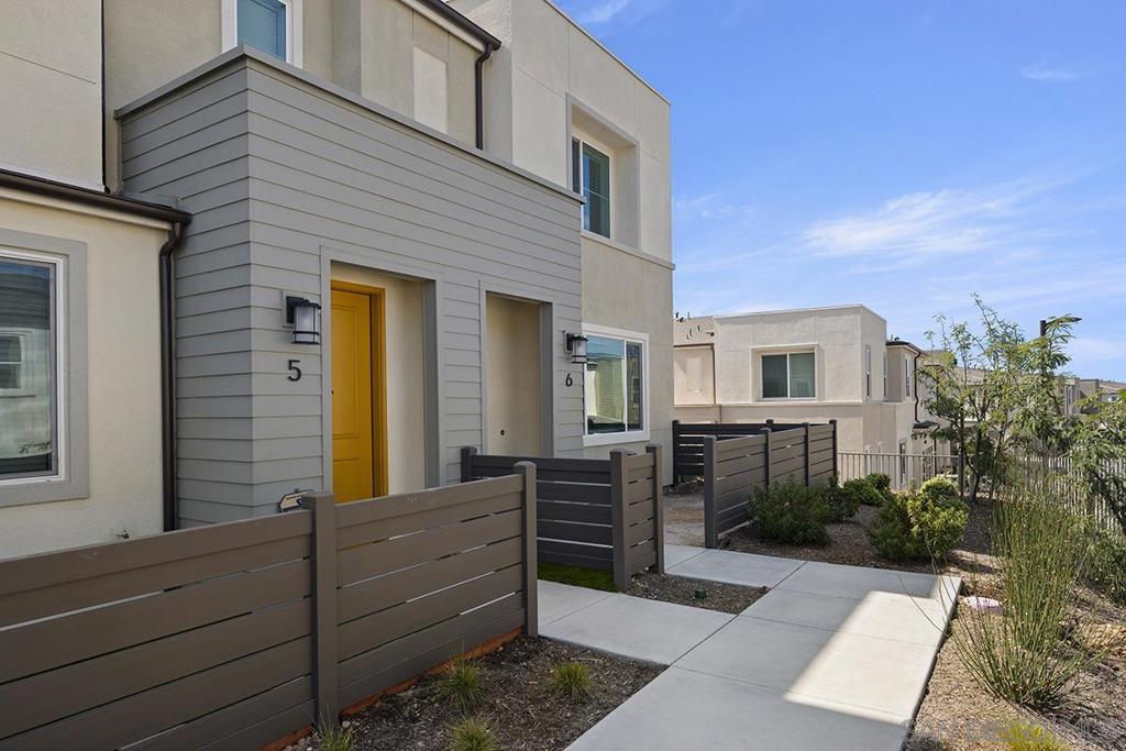 Stunning newer construction end unit townhome in a quiet, bright, and breezy location featuring 4 bedrooms and 2.5 bathrooms. Upon entry you are greeted to an open concept floor plan with your formal great room open to your oversized Chef's kitchen. Custom fixtures galore and home features solar and EV charging! Generous sized primary bedroom with ensuite bathroom featuring a spacious walk-in closet. Three secondary bedrooms and an upstairs hall bath with modern finishes. Laundry room conveniently located upstairs. Two car attached garage. Beautifully designed master plan community featuring community amenities with a pool, clubhouse, basketball court, picnic area, dog parks, exercise room, pickle ball, playground/tot lots, BBQ, and more! Convenient access to the 805 freeway, Ralph's Grocery, Sharp Medical Center, etc. This is a must see!