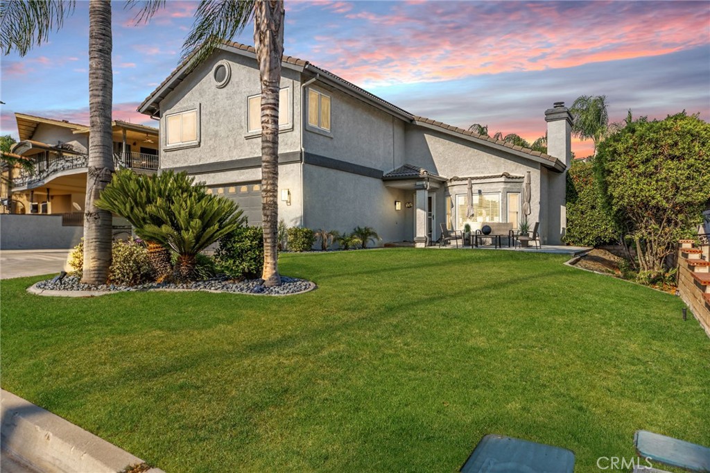 Welcome to this spacious 4 bedroom, 3 bathroom Canyon Lake home offering 2,217 sq ft of well-designed living space. Situated directly across from the Equestrian Center, and a short walk to the baseball fields, this two-story property has an amazing location and features an oversized 2-car garage plus 58 feet of gated RV parking. The downstairs includes a bedroom with direct exterior access and a 3/4 bathroom with a step-in shower, along with a formal living and dining room, cozy kitchen with eating area, and a family room that opens to the large, fully fenced backyard. The yard is perfect for entertaining or future pool plans and includes a large Alumawood patio cover. Upon entry, you’ll find soaring vaulted ceilings and a charming wood-burning fireplace. Upstairs includes two generous secondary bedrooms with vaulted ceilings and ample closet space, a shared oversized bathroom, and a versatile loft or reading nook. The primary suite offers dual closets, dual sinks, and a jacuzzi tub with new glass shower doors. Additional upgrades include newer dual-pane vinyl windows and sliders (installed in 2019), ceiling fans in all rooms, a whole-house fan, indoor laundry, and freshly painted exterior. Ideally located on the north side of the lake near the North Gate, this home provides easy access to the 15 freeway. Canyon Lake is a 24 hour guard gated community with a private 525 acre lake, premiere wakeboarding and waterskiing, 18 hole SCGA rated golf course, Lakefront pool and clubhouse, Lakefront RV park, Equestrian center, tennis, basketball & pickleball courts, baseball fields, 4 beaches, 9 parks, an amphitheater, docks, a bicycle pump track, Senior Center, over 40 clubs to join and so much more!