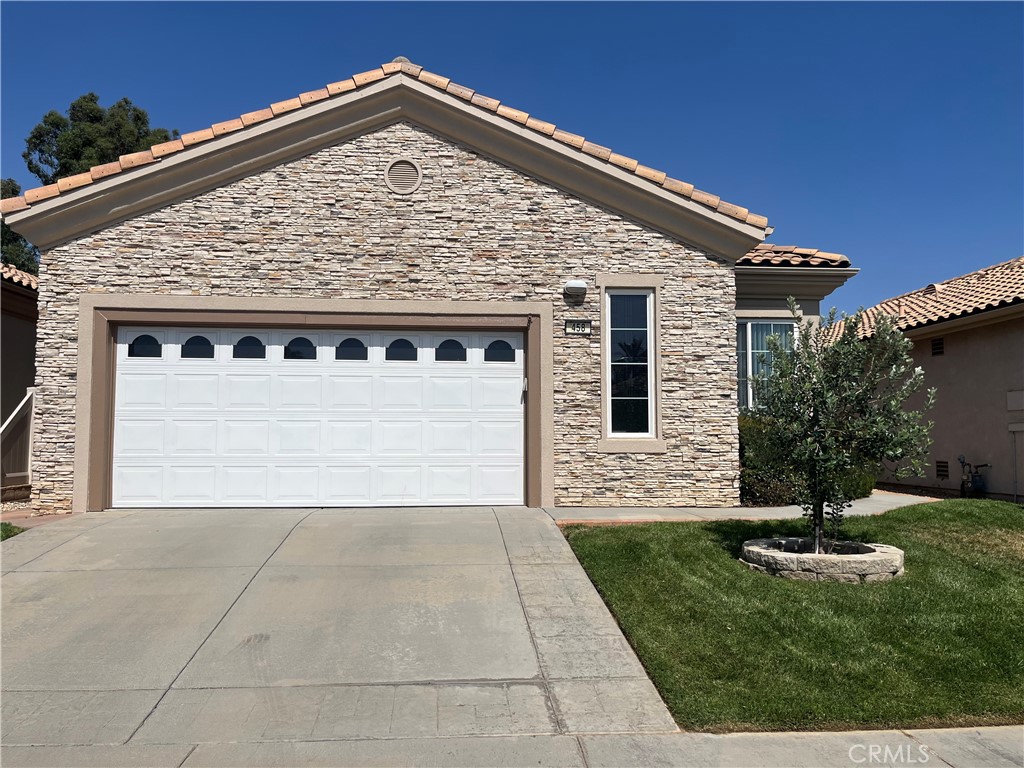 Come see this popular Pave model in the beautiful premiere Sun Lakes Country Club, an active 55+ resort style living community. This home features 2 nice sized bedrooms, 2 bathrooms, an office/den, inside laundry, 2 car garage with golf cart parking, and a backyard that is on the golf course and surrounded by mountains, great for relaxing or entertaining under the solid alumawood covered patio. The kitchen opens into a great room for an open floor plan, all having wonderful natural light. Both bedrooms are on the opposite sides of the house, and the refrigerator, washer and dryer are included.The inside laundry room has a utility sink with cabinets. The amenities are enormous with 3 clubhouses, 3 pools & spas (one being indoor), 3 gyms, 3 libraries, bocce ball courts, pickleball, tennis, and pop tennis courts, 2 restaurants and a bar & lounge with happy hours, 2 18 hole golf courses, live entertainment Friday and Saturday nights and so much more! Over 60 clubs to choose from in getting involved. This is a great active place to be but can also just relax and enjoy the beautiful surroundings. No Mello Roos plus internet and cable are included in the HOA fees. Restaurants, shopping, hospital and medical offices, movie theater, Morongo casino, Cabazon outlet stores, bowling and freeway access to the 10 are close by. Be a part of this lifestyle and enjoy for years to come!