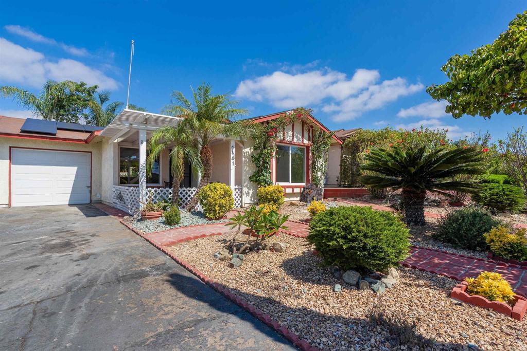 Welcome to Peacock Hills, Oceanside’s Premier 55+ Community! This beautifully renovated 2-bedroom, 1-bath home offers 834 square feet of light, bright, and stylish living. From the moment you arrive, you’ll notice the charming curb appeal with mature landscaping and a shaded front porch—perfect for enjoying your morning coffee or an evening breeze. Step inside to discover a fresh, modern interior featuring new light-toned luxury vinyl plank flooring, 4.5" baseboards, fresh paint throughout, and sleek LED recessed lighting. The brand-new dual-pane windows and sliding glass door enhance natural light and energy efficiency. The kitchen has been fully reimagined for the home chef, with brand-new cabinetry, stylish bright and white countertops, stove and dishwasher, and an oversized sink with a contemporary faucet. The bathroom has been upgraded with a walk-in shower featuring a glass partition, a new vanity, modern fixtures, and updated lighting. Interior doors and hardware have all been replaced to match the fresh aesthetic throughout. Step out back to enjoy a private, low-maintenance yard complete with a mature grapevine and a storage shed—ideal for gardening tools or extra storage. The one-car garage is clean and crisp, freshly painted with a professionally applied epoxy floor. Additional upgrades include a 2019 water heater and solar at just $109/month, offering energy savings year-round. Move-in ready and full of upgrades—this is the one you've been waiting for!