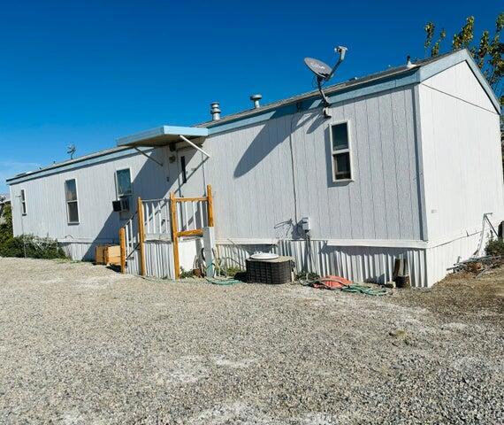 3 bedroom 2 Bath double wide manufactured home. Currently being rented out to tenants.May be view with tenant permission. Space rent is currently $700 a month.