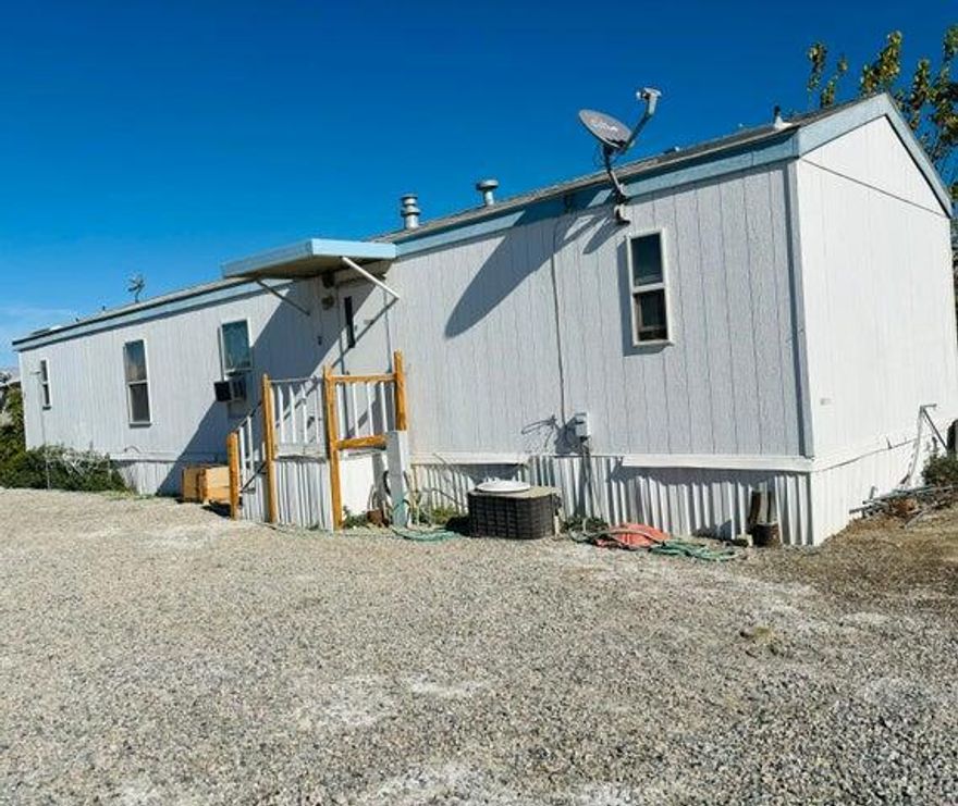 3 bedroom 2 Bath double wide manufactured home. Currently being rented out to tenants.May be view with tenant permission. Space rent is currently $700 a month.