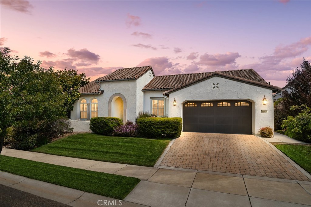 Welcome to 1147 Vaquero, a beautifully upgraded residence in the prestigious Trilogy at Monarch Dunes, an active lifestyle community on California’s Central Coast. This thoughtfully designed 2,558 square foot home offers elegance, comfort, and functionality in every detail.
Inside, updated wood flooring flows seamlessly throughout the home, creating warmth and sophistication. The spacious living room is enhanced by custom ceiling beams that add depth and character, while the updated kitchen features new countertops and backsplash, making it both stylish and practical for everyday living and entertaining. A guest bedroom with its own ensuite bath, complete with walk-in shower and shutters, provides privacy and comfort for visitors. The home also offers a den, a formal dining area, a convenient half bath, and a well-appointed laundry room with cabinetry, sink, and extra storage. The garage includes extended space that can be used for additional storage or a workspace, adding to the home’s versatility.
The primary suite is a private retreat, featuring two walk-in closets, linen storage, and an additional bonus room that can serve as an office, workout area, or flexible space to suit your needs. Best of all, this home is equipped with owned solar, providing energy efficiency and peace of mind.
Outdoors, the property boasts an exceptionally private backyard—an ideal setting for relaxing, entertaining, or simply enjoying the beautiful Central Coast weather.
Life at Trilogy at Monarch Dunes means resort-style living every day. Residents enjoy access to championship golf, tennis and pickleball courts, fitness centers, indoor and outdoor pools, fine dining, and a full calendar of social events. Whether you are seeking a full-time residence or a weekend retreat, 1147 Vaquero offers tranquility, elegance, and an elevated lifestyle in one of the most sought-after communities on the coast.