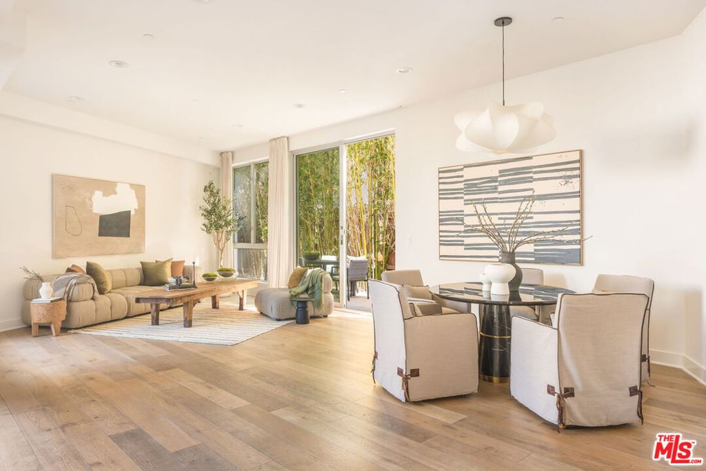 Discover this stunning 2-bedroom, 2-bathroom condo in the City of West Hollywood. Designed by award-winning architect Michael B. Lehrer, FAIA, this architectural masterpiece features soaring ceilings and an open floor plan that creates a spacious and airy atmosphere. Flooded with fabulous natural light, the residence boasts an expansive wraparound outdoor space perfect for relaxation and entertaining. Located just moments from Melrose Place, Los Angeles's premier shopping and dining destinations, West Hollywood Farmers Market, and the West Hollywood Design District, this condo offers the best of city living. Additional highlights include subterranean side by side parking with a dedicated Tesla charger, private oversized storage locker, and ADT wired security cameras throughout. Don't miss the opportunity to own this exceptional West Hollywood property.