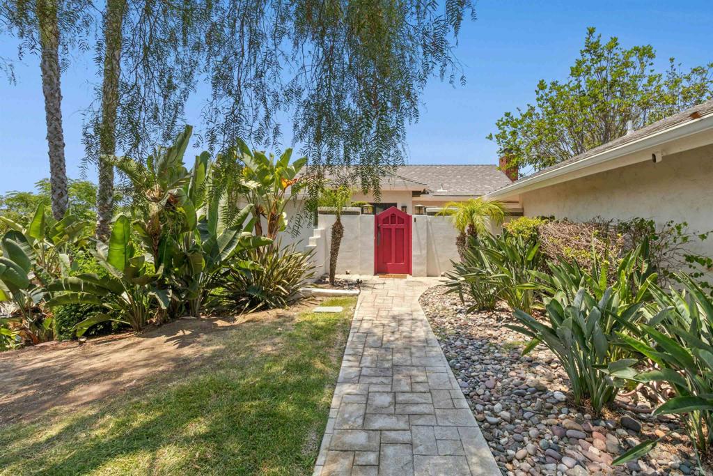 Tucked away in a quiet neighborhood, this beautifully maintained 3-bedroom, 2.5-bath home plus bonus room offers the perfect blend of comfort, function, and outdoor living. The reverse floor plan places the main living areas upstairs to take full advantage of sweeping mountain and tree-lined views. Cherrywood floors add warmth and charm to the upper level, where you’ll find a light-filled family room, dining area, and a spacious kitchen—all flowing seamlessly to a newly built deck, ideal for enjoying colorful sunsets and morning coffee alike. Downstairs, the bedrooms offer privacy and quiet, while the versatile bonus room is perfect for a home office, gym, or teen hang-out. Step into the large backyard which features a sparkling saltwater pool, relaxing jacuzzi, and a built-in BBQ island under a large palapa for shaded entertaining. Located in the highly sought-after Poway Unified School District and close to hiking trails, shops, and dining, this home is your private escape with all the conveniences of modern living.