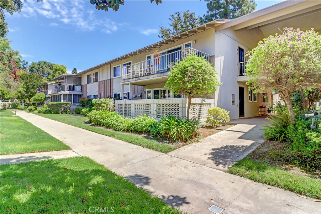 2BD/2BA "Majorca" co-op located on a beautiful, quiet street with ample parking for your guests. Lower level unit with close carport and 2 community laundry rooms. Milgard dual pane windows throughout. The interior features many original components maintained by the HOA. Spacious living room with french sliding doors and sidelights leading out to the covered patio. Dining area has ceiling fan and adjacent kitchen enjoys a window over the sink and added dishwasher. 2 spacious bedroom with lots of storage behind the mirrored closet doors. Guest bathroom houses walk-in shower and primary bath features tub/shower combo. This building is one of the first to experience Laguna Woods new fiber internet. Great walkable location in the middle of the gated area - enjoy Clubhouse 1 with pool, gym, bocce ball, archery, shuffleboard, drop-in lounge and library and Clubhouse 3 - the Performing Arts Center of Laguna Woods. Laguna Woods Village residents enjoy a 27-hole championship golf course, a 9-hole executive par 3 course, pickleball and tennis courts, lawn bowling, gyms, clubhouses, swimming pools, horse stables, gardening centers, artist studios, computer workrooms and classes + over 200 clubs and organizations.